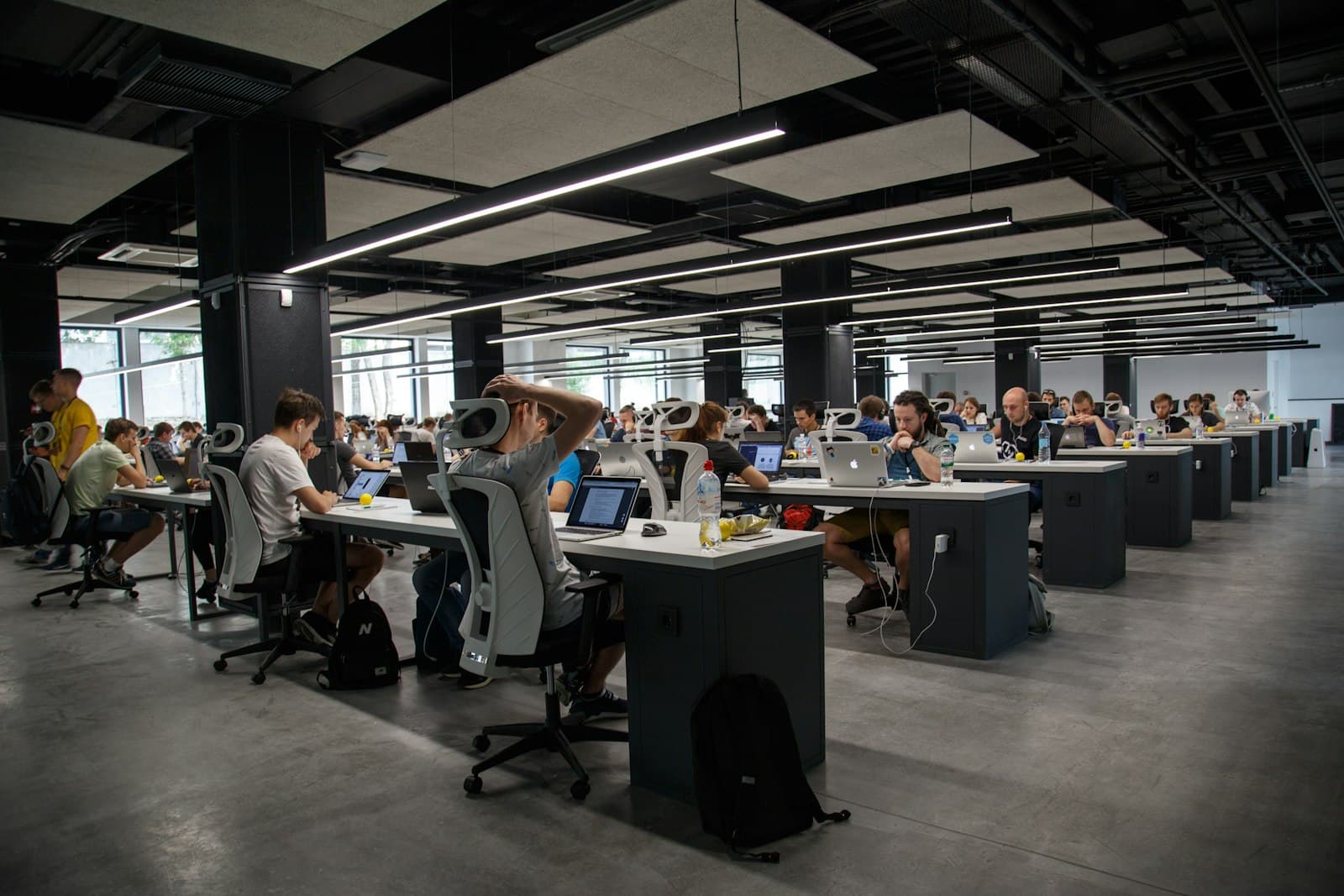 PCS engineering teams at work across an open delivery floor